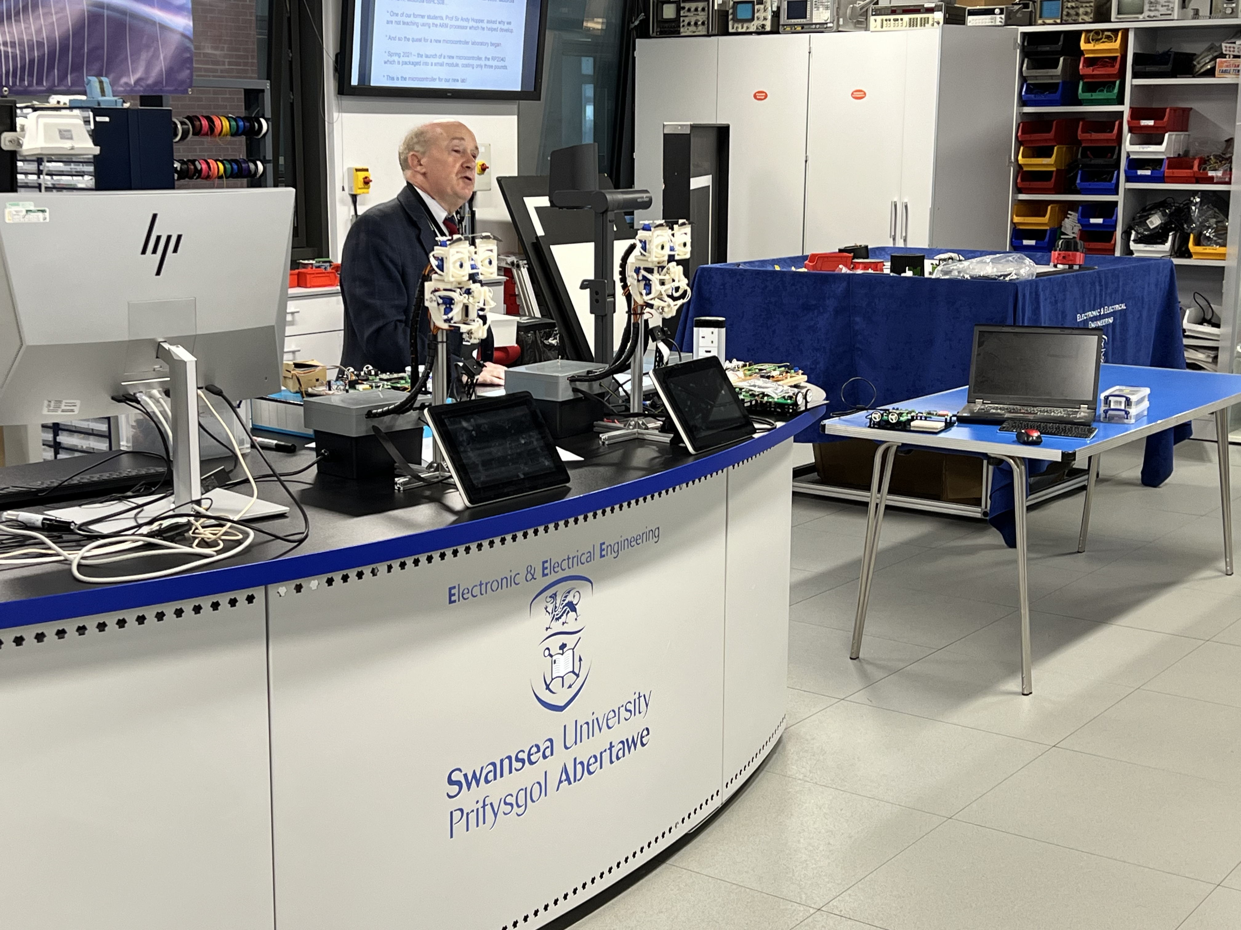 A photograph of Dr Davies lecturing in the Electronics Lab